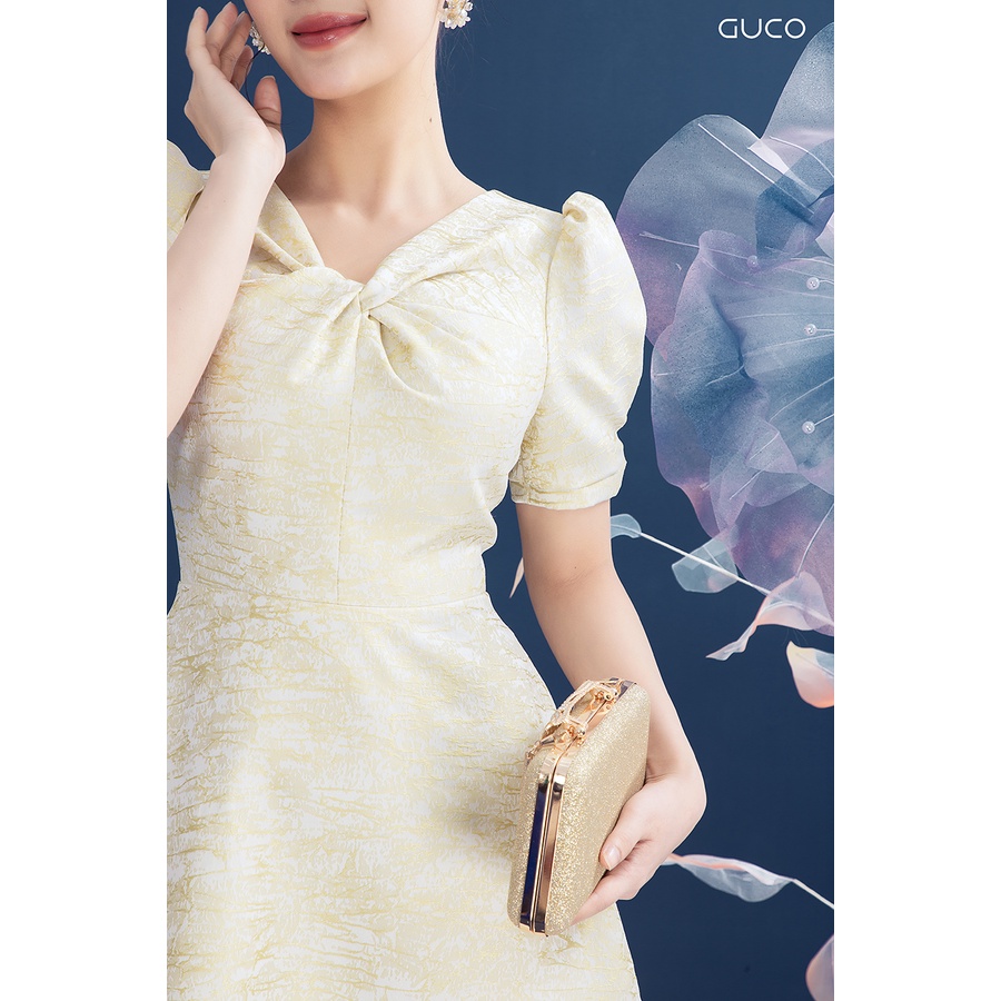 Đầm dáng xòe cổ nơ xoắn 3846 GUCO Vàng