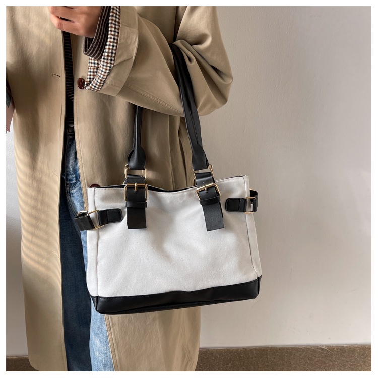 Túi xách đeo vai size trung vải canvas phối da mỏng