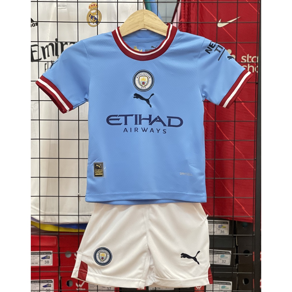 Quần áo bóng đá trẻ em MANCITY màu xanh da 22-23 HÀNG THÁI CÓ IN TÊN SỐ