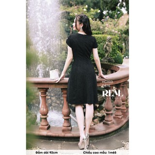 Đầm công sở tôn dángmia đen_REAL