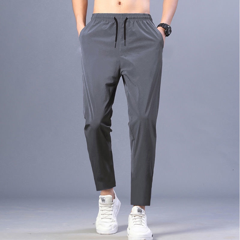 Quần dài nam phong cách thể thao, form Slimfit, ống suông, co giãn 4 chiều, trẻ trung, năng động - Hai màu đen, xám QPL