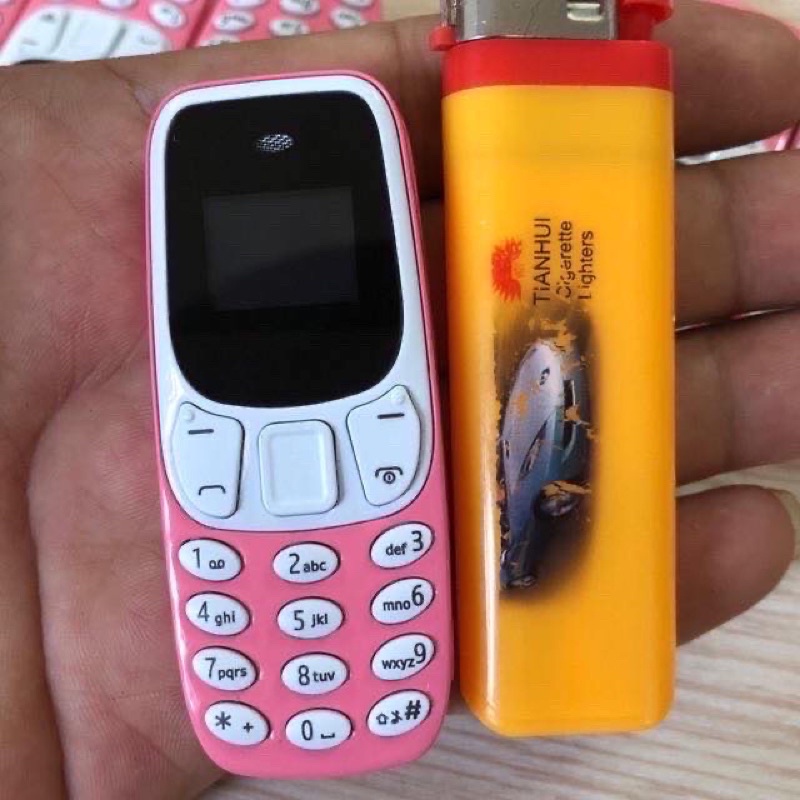 Điện thoại mini Siêu Nhỏ 02 sim 02 sóng gắn được thẻ nhớ