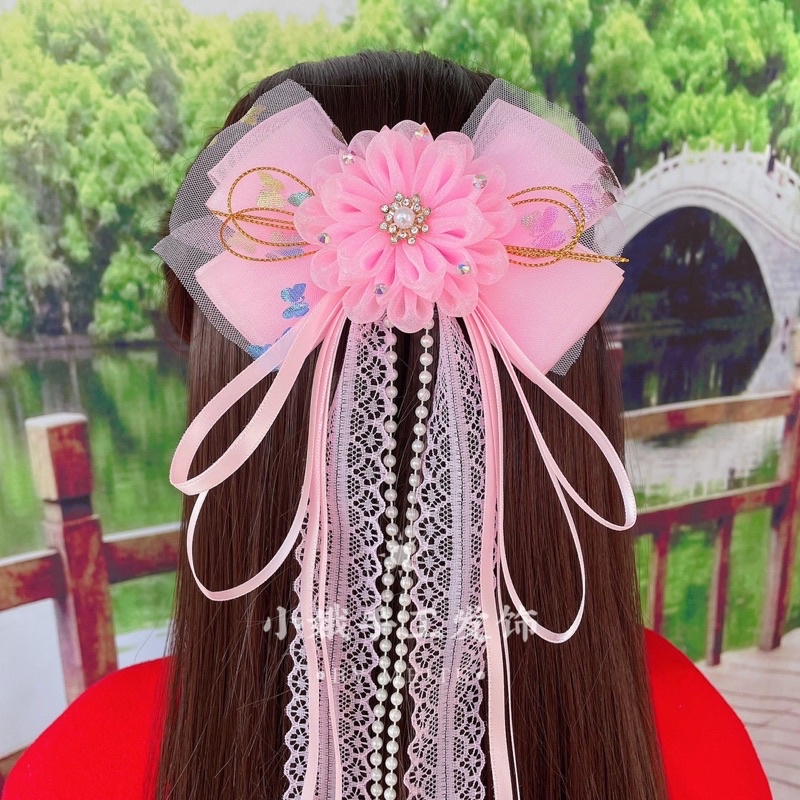 kẹp tóc nơ cổ trang tua hạt trai