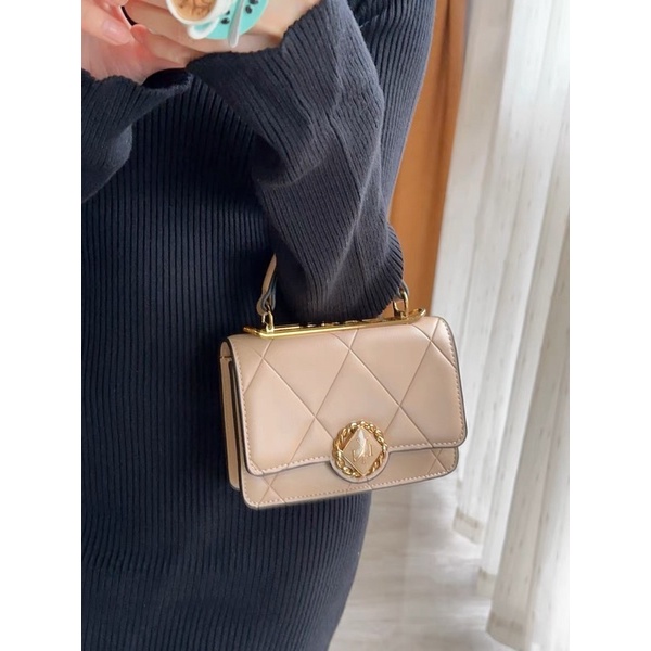 Túi lyn tay cầm khó tròn