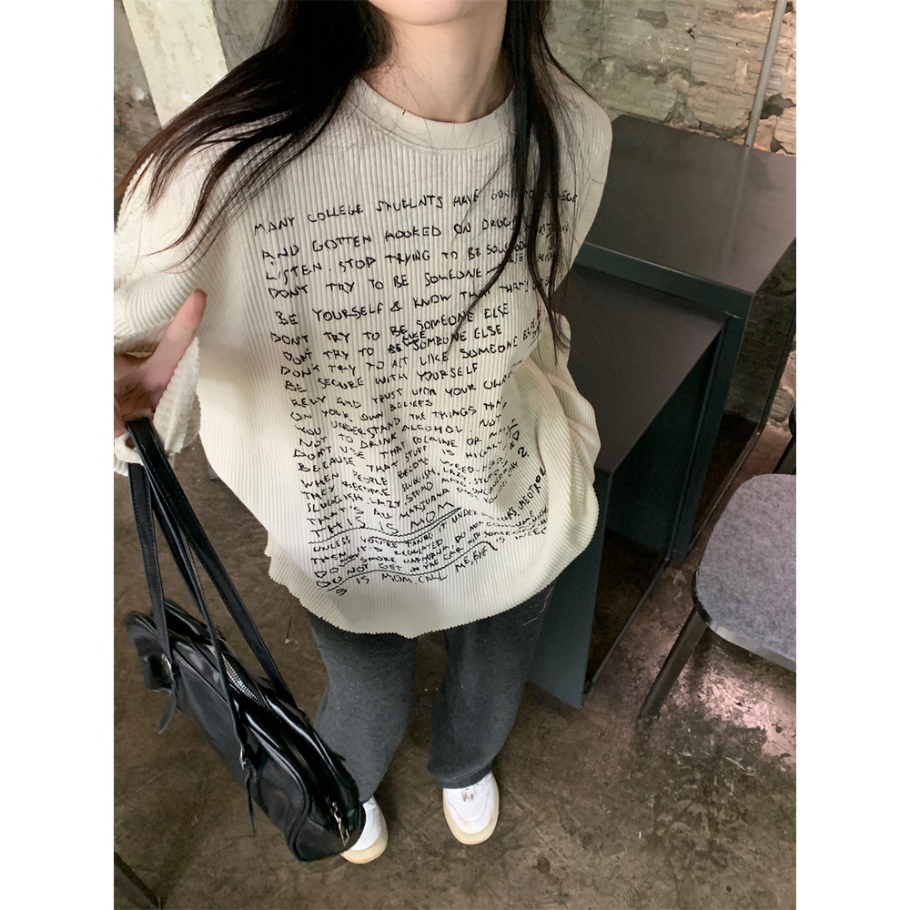 Áo thun nữ tay dài thun gân trắng in nhiều chữ đen áo form rộng/ áo ôm