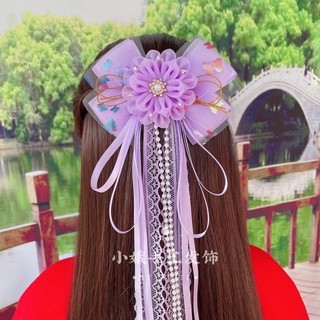 kẹp tóc nơ cổ trang tua hạt trai