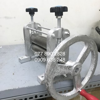 Máy cán mực tẩm gia vị, máy giãn mực cán mực khô