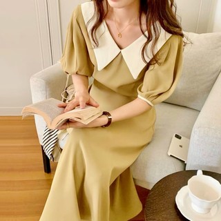 Đầm kem cổ trắng form dài thắt eo