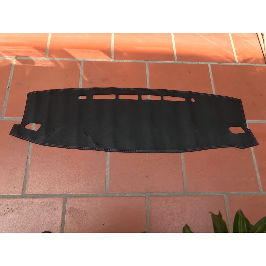 Thảm taplo da vân cacbon Fortuner ;