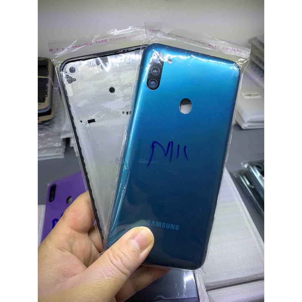 Bộ vỏ zin samsung M11 - gồm lưng, xương, phím, kính camera