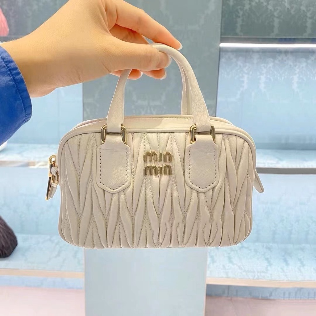 Túi cầm tay đeo chéo MIUMIU TRỐNG SZ21