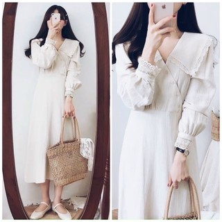 Đầm trắng nút xéo cổ viền ren
