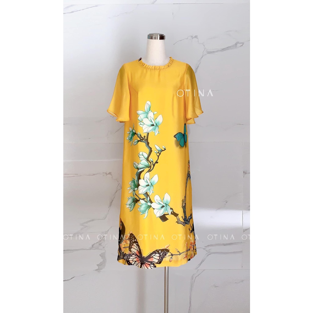 Đầm lụa hoa lan nền vàng