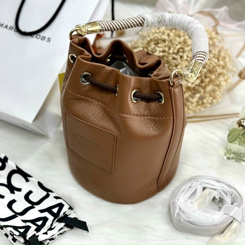 Túi Mác Jcobs bucket da bò