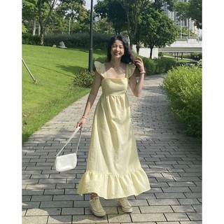 Váy midi sọc vàng cut out nơ lưng (Freesize)