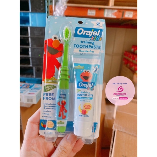 Set bàn chải và kem đánh răng Orajel Training Toothpaste 28,3g cho bé - BAABEELAND