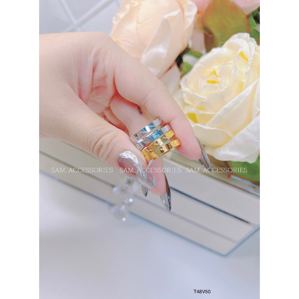 Nhẫn titan hiệu X nửa đá nửa chữ