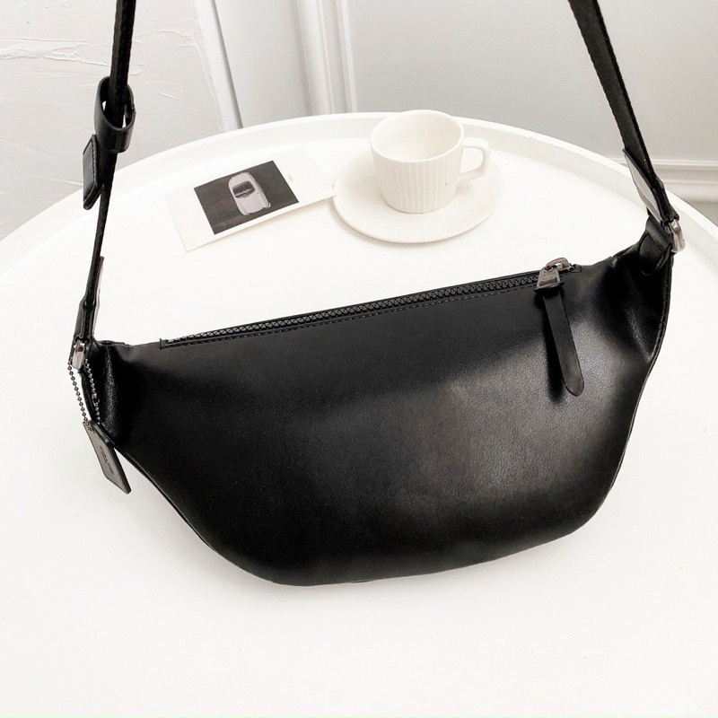 Túi bao tử nam Coach Rivington Belt Bag