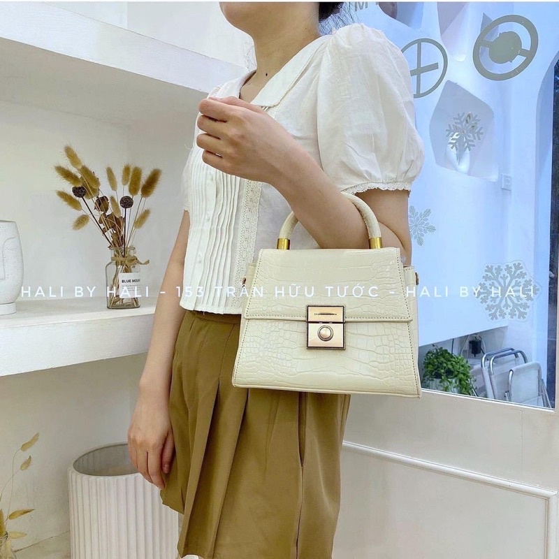 Túi cnk quai xách da sần