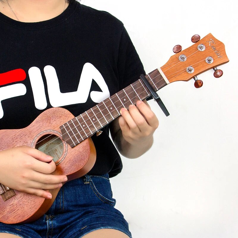 Capo kẹp đàn Ukulele (Tặng kèm Pick gảy)