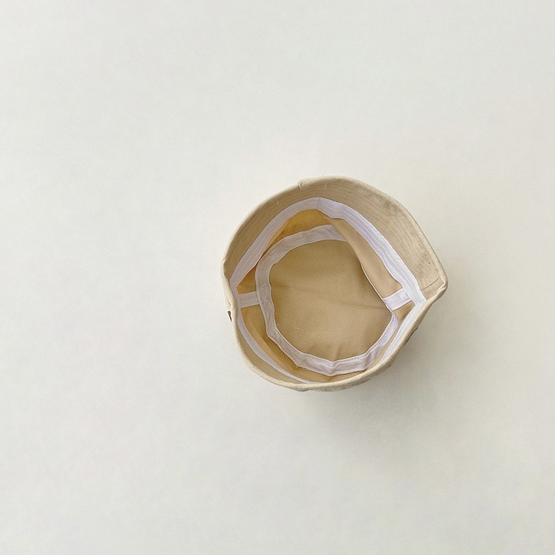 Mũ bucket vành cụp cho bé, gắn tag da ngầu