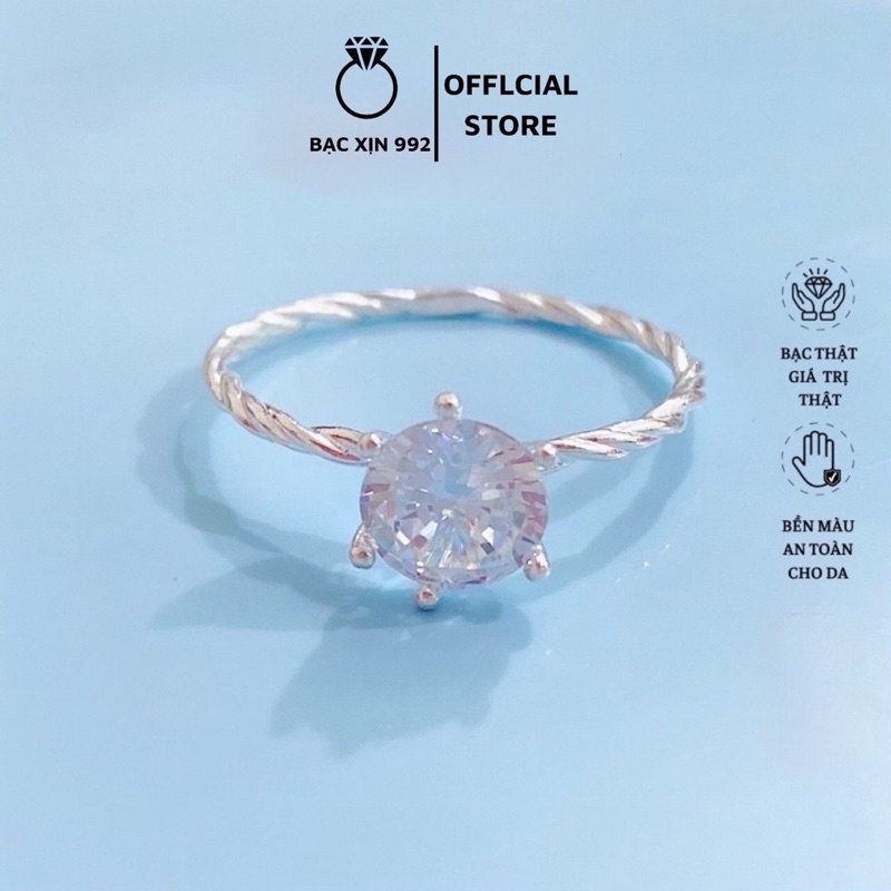 Nhẫn thân xoắn đính đá.bạc ta