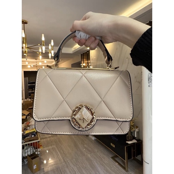 Túi lyn tay cầm khó tròn