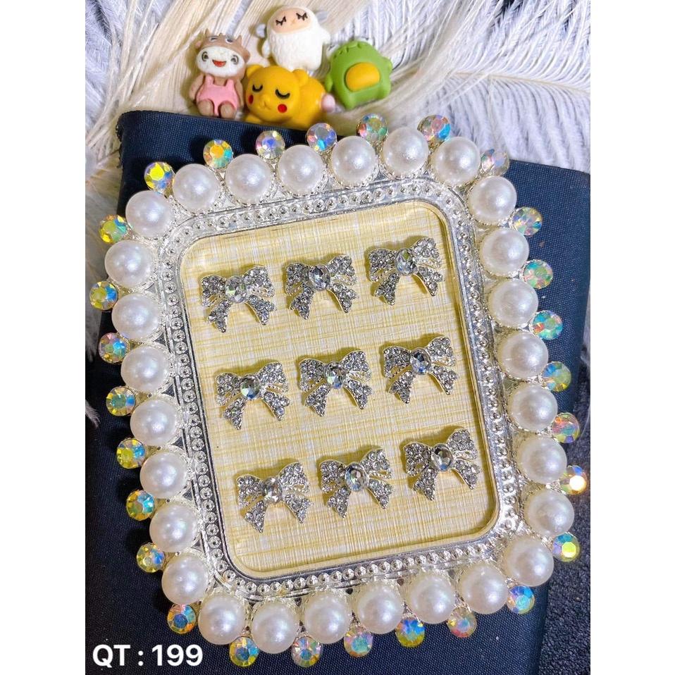 mã charmm nơ đính đá a