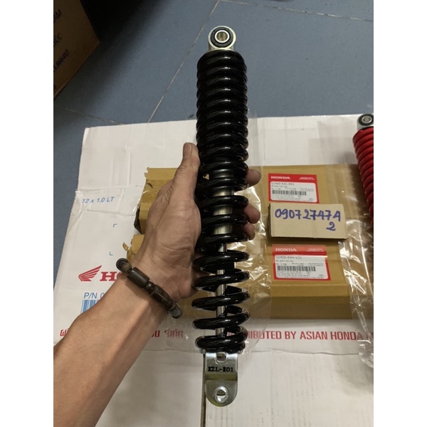 Phuộc sau vision đời  đen + đỏ zin hãng Honda