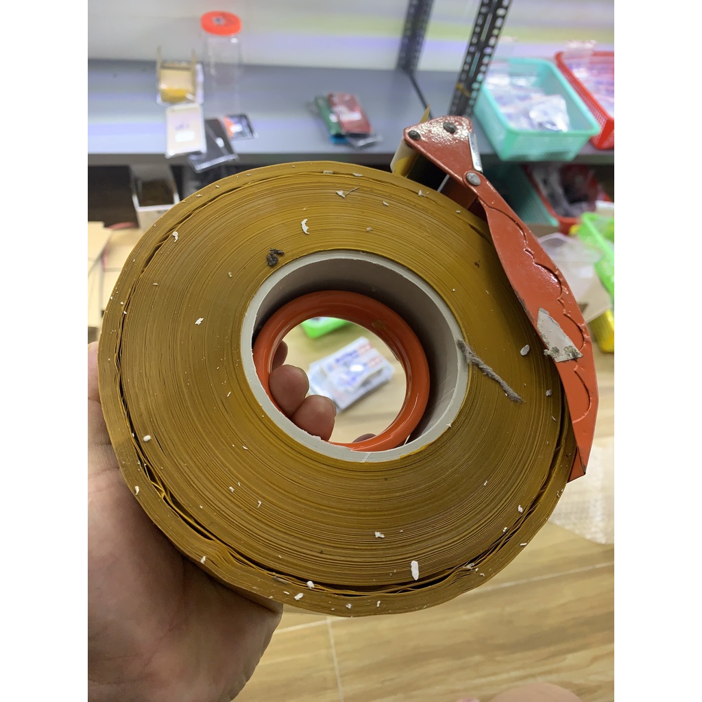Cuộn băng dính đóng hàng đục, trong siz 5cm x 1kg ( Loại lõi mỏng - 3mm)