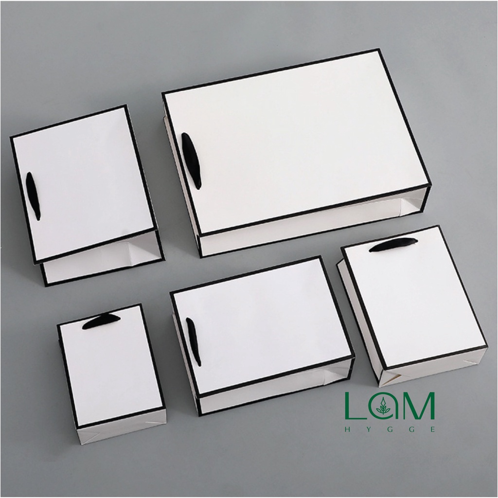 Túi giấy bìa cứng trắng viền đen, quai xách vải đen