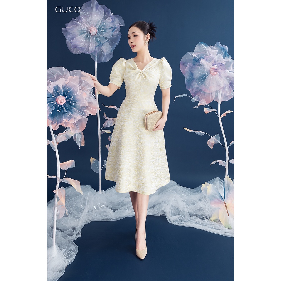 Đầm dáng xòe cổ nơ xoắn 3846 GUCO Vàng