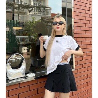 Set chân váy đen xếp ly + áo thêu phối