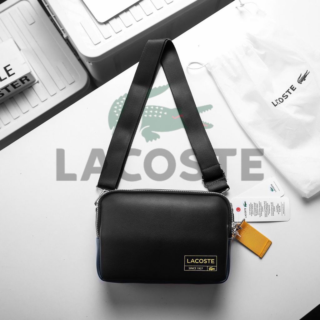 Túi chéo Lacoste da si chống nước màu đen túi đeo vai nam unisex logo và tép kéo chuẩn 2 ngăn và 1 ngăn phụ bên trong