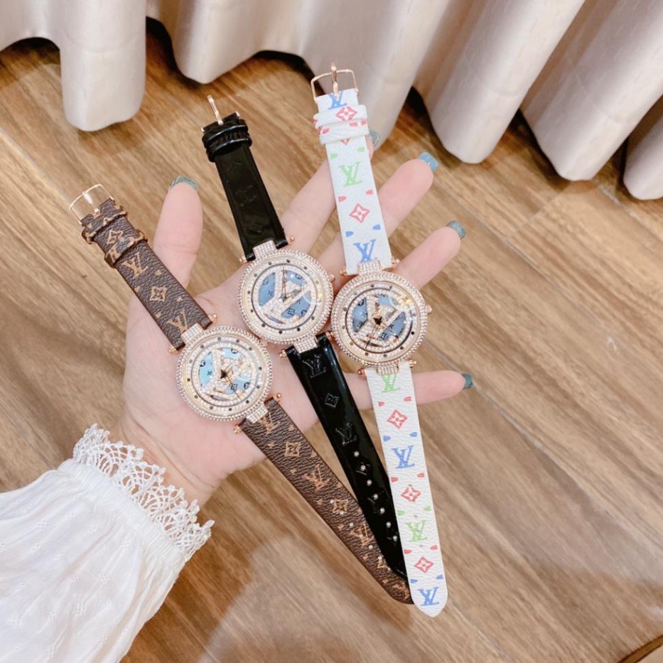 Đồng hồ nữ LV mặt xoay, đính đá, dây da có hoa văn size 34mm, bảo hành 12 tháng