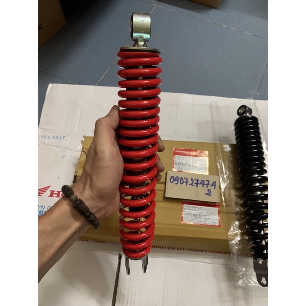 Phuộc sau vision đời  đen + đỏ zin hãng Honda