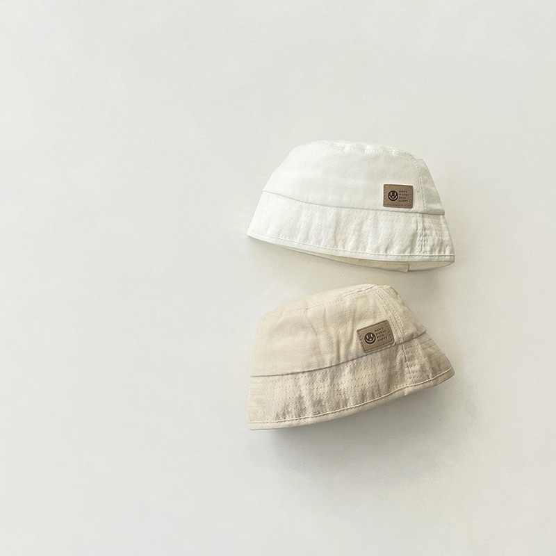 Mũ bucket vành cụp cho bé, gắn tag da ngầu