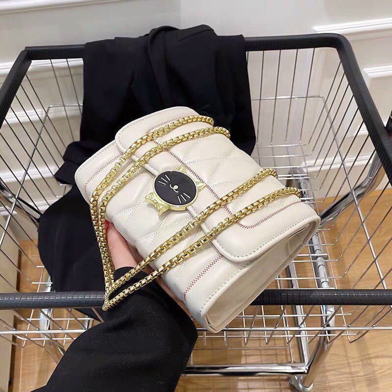 Túi xách nữ khóa mèo 2 màu đen trắng dây xích vàng đeo 2 kiểu cực đẹp Capucha T278