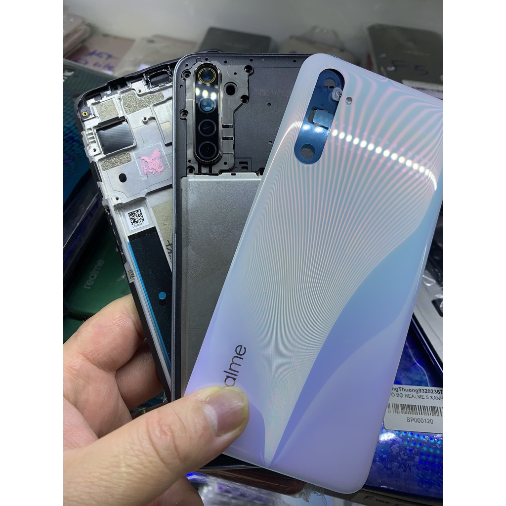 Bộ xương vỏ, lưng realme 6 - gồm lưng , sườn , xương máy, phím bấm và cụm kính camera