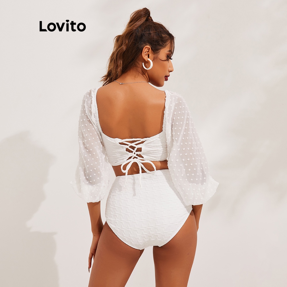 Bikini Lovito màu trơn dáng ôm khoét rỗng đính nơ phong cách Boho L13X118 (Màu trắng)