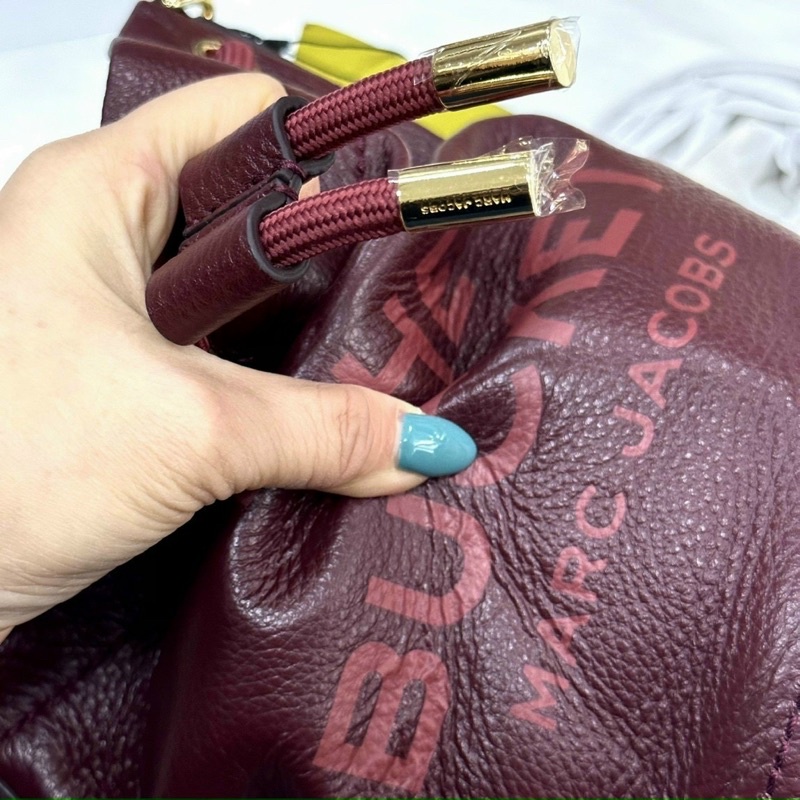 Túi Mác Jcobs bucket da bò