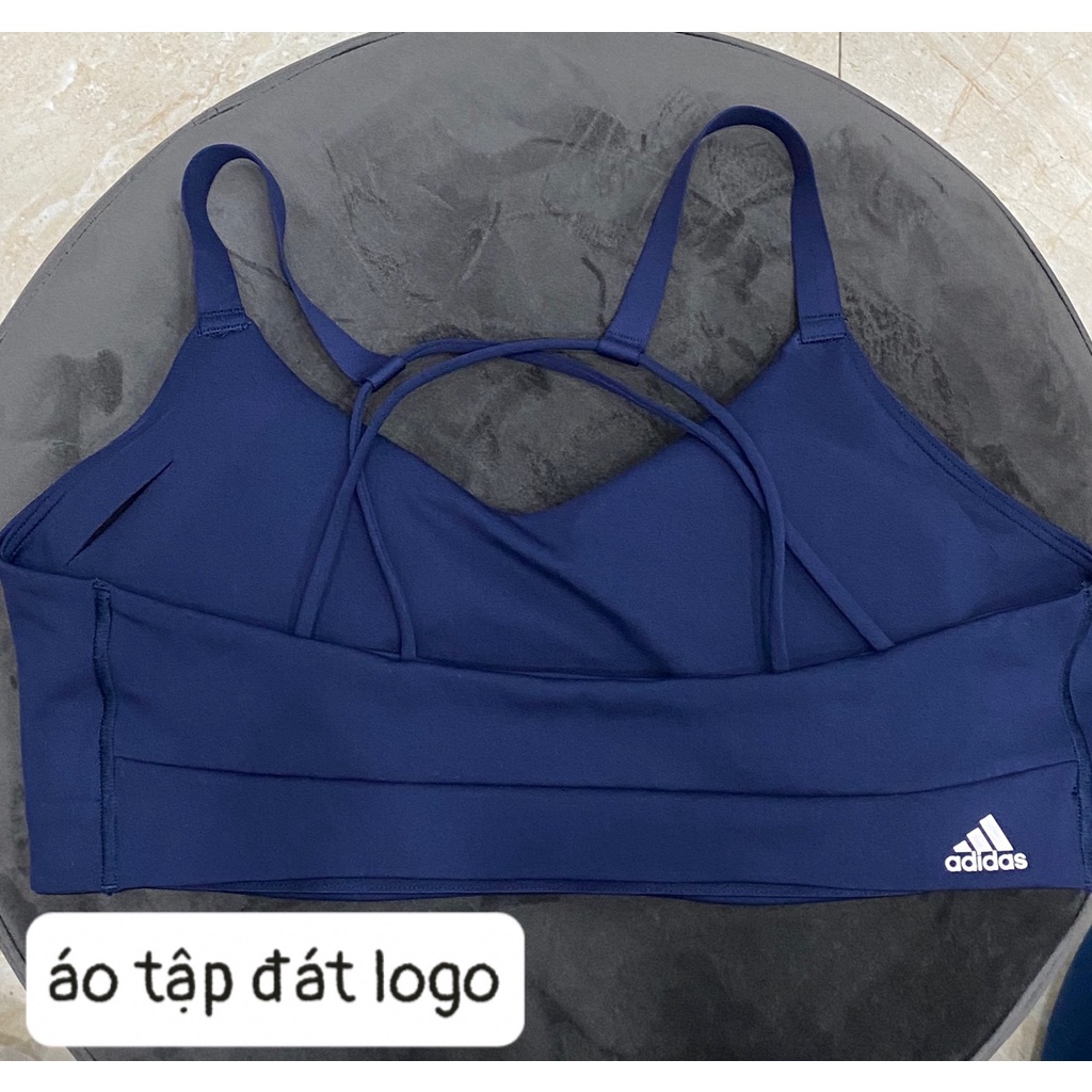 Áo tập Đát logo