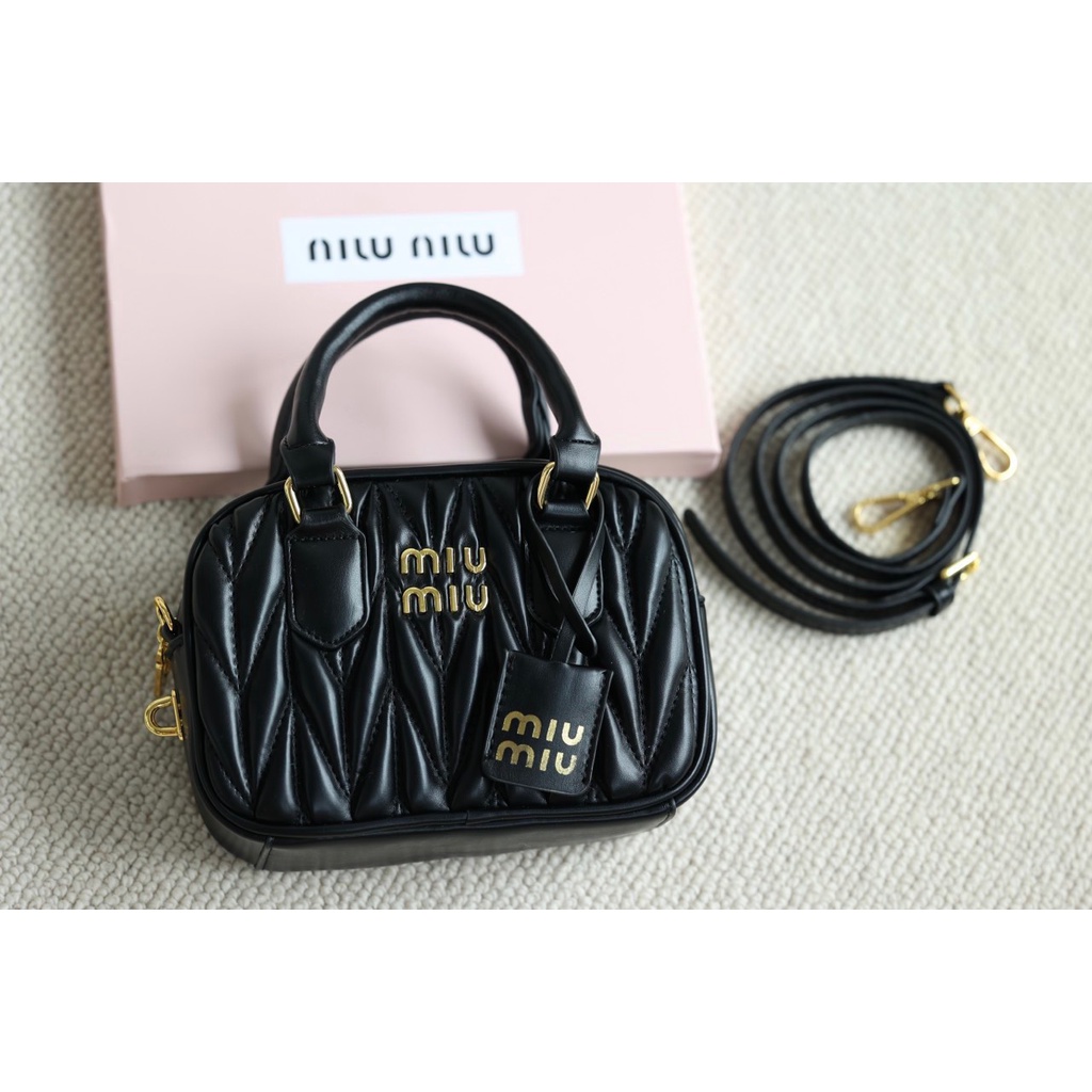 Túi cầm tay đeo chéo MIUMIU TRỐNG SZ21