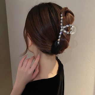 Kẹp tóc càng cua đính đá pha lê chấm đen