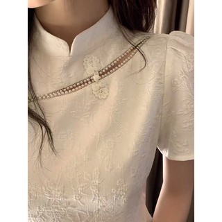 Váy gấm dáng ngắn cổ tàu đính ngọc chéo