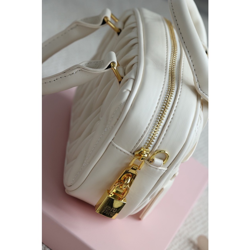 Túi cầm tay đeo chéo MIUMIU TRỐNG SZ21