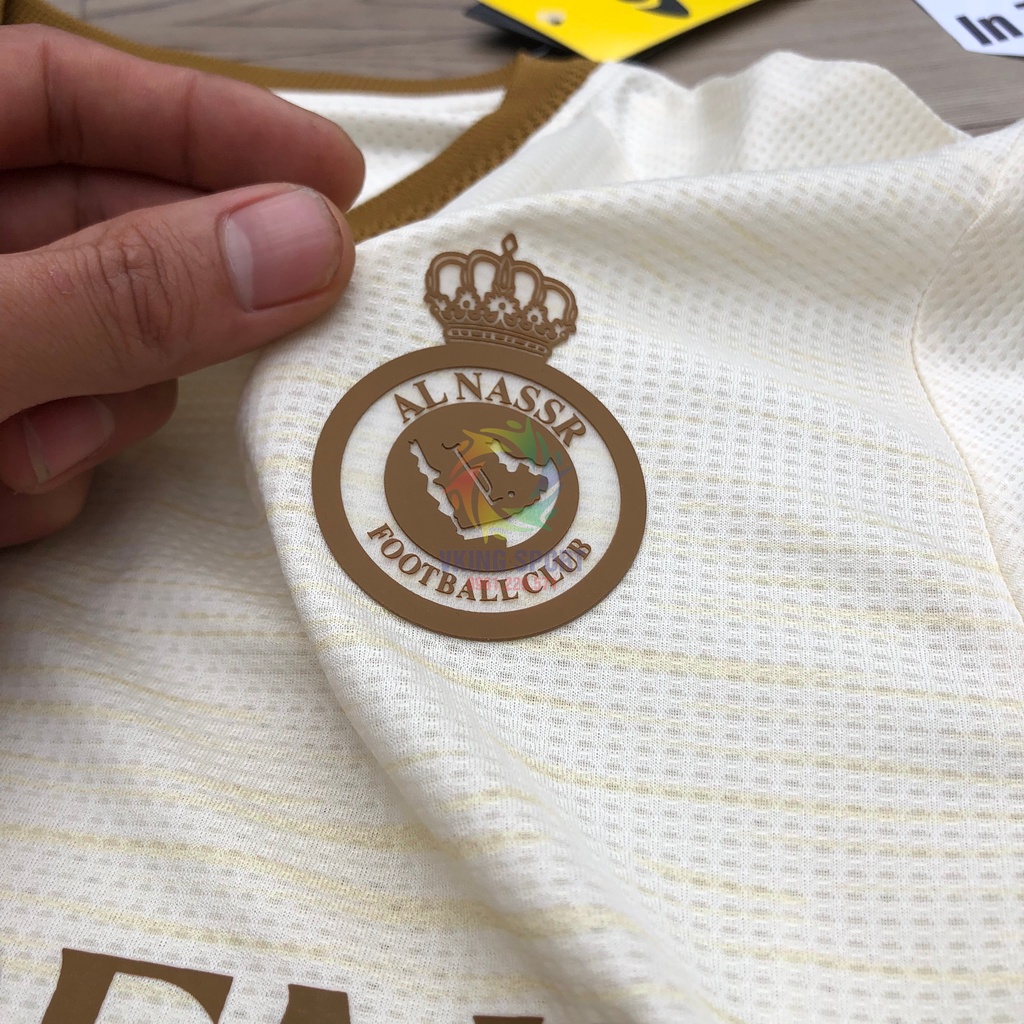 Bộ Quần Áo Bóng Đá AL Nassr 2023 Sân Khách Màu Kem Vải Thái Có In Tên Số Theo Yêu Cầu