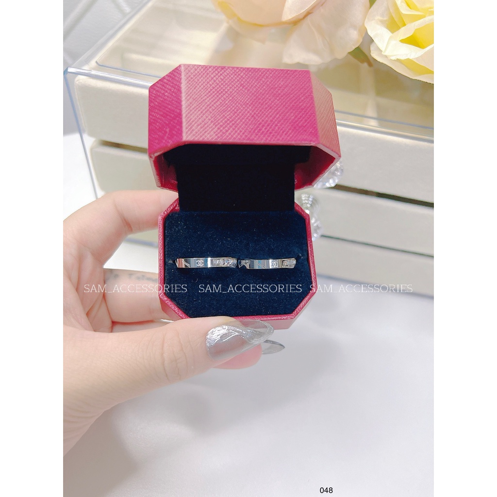 Nhẫn titan hiệu X nửa đá nửa chữ