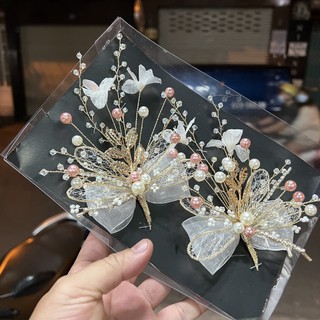 Đôi cài tóc cô dâu nơ voan đính hạt hồng