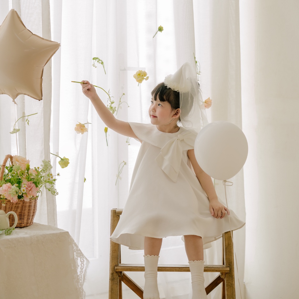 Váy xinh cho bé gái Sora.bébé Ivy Cream Dress chất liệu tafta cao cấp phối nơ bản to